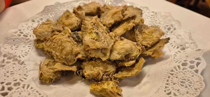 Alcachofas laminadas fritas